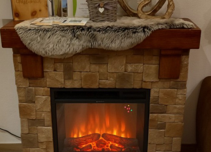 Der Kamin: „Behagliche Abende am Kamin – Wärme und Romantik pur“